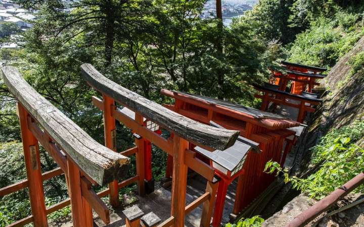 Vibrant red torii gates of Taikodani Inari Shrine in Tsuwano, Japan – a historic spiritual site nestled in the mountains of western Japan, known for its stunning hillside views and Shinto heritage