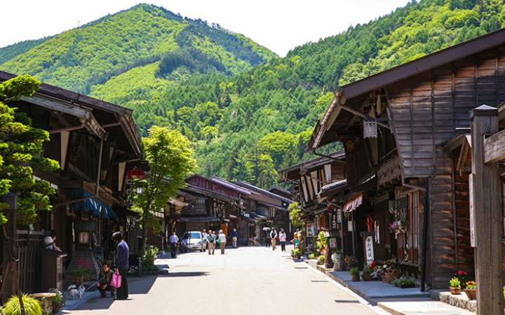 Historic post town of Narai-juku on the Nakasendo Trail in Japan – preserved Edo-period wooden buildings, traditional inns, and scenic mountain setting in Nagano Prefecture