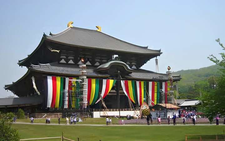 Todai-ji Temple in Nara, Japan, decorated with colorful festival banners during a cultural celebration – a historic Buddhist site and top travel destination in Japan.