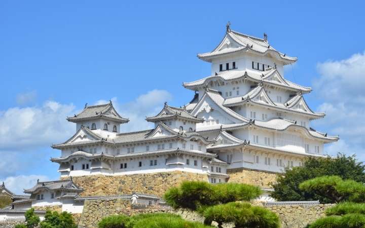Himeji Castle, a UNESCO World Heritage Site in Japan, featuring its iconic white exterior and historic samurai architecture